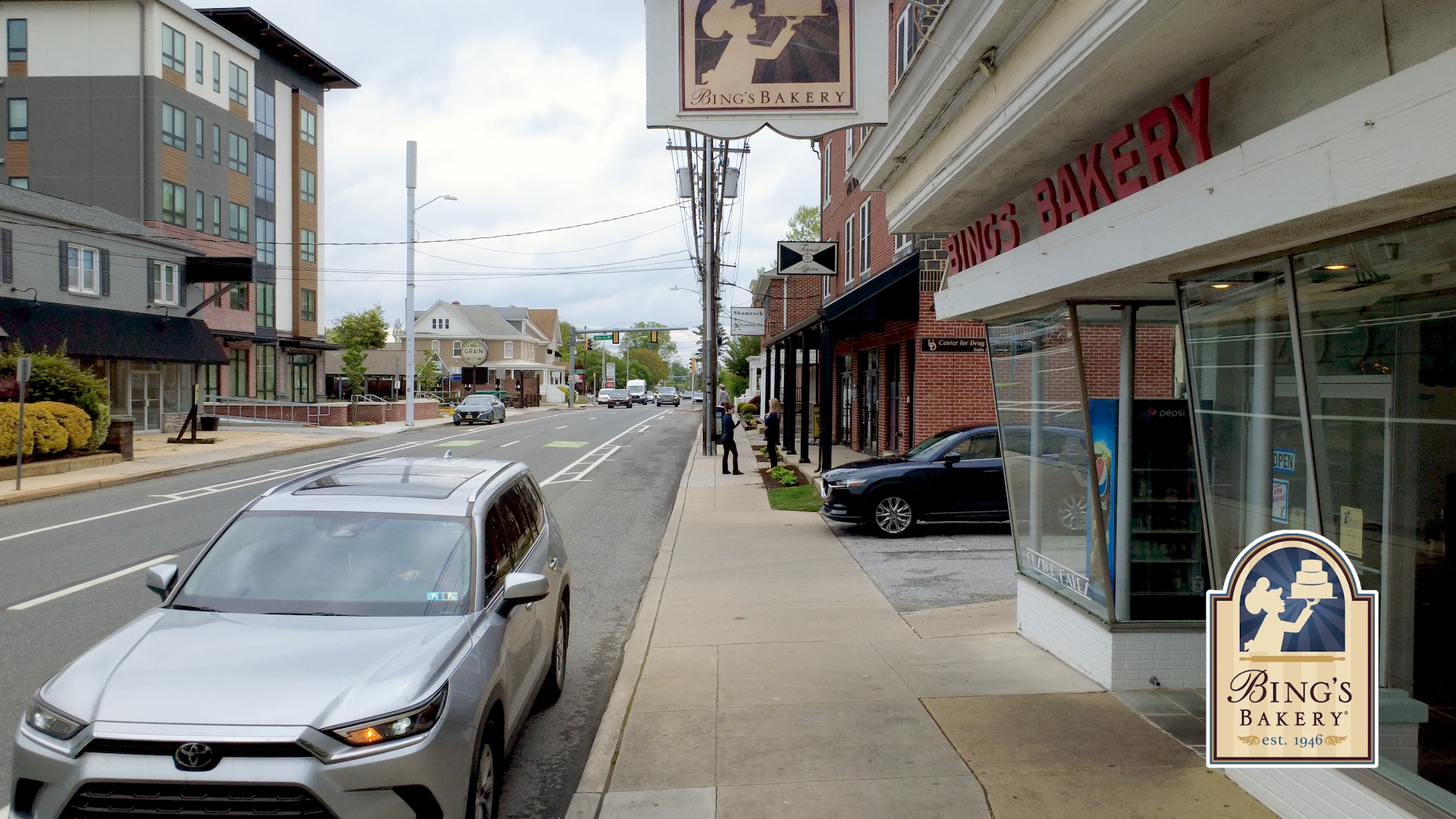 Street-level view of Bings Bakery storefront in Newark, Delaware